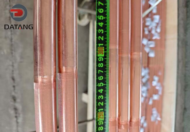 Precision length measurement of copper low fin tubes by Datang Finned Tube QC team
