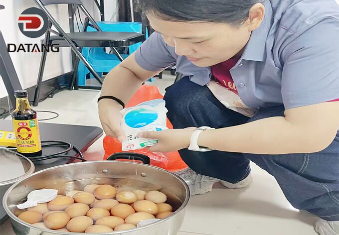 Fragrant Chinese tea eggs simmering in the pot during the festive celebration at Datang Finned Tube factory kitchen